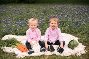 Photo of boys with bunny in flowers